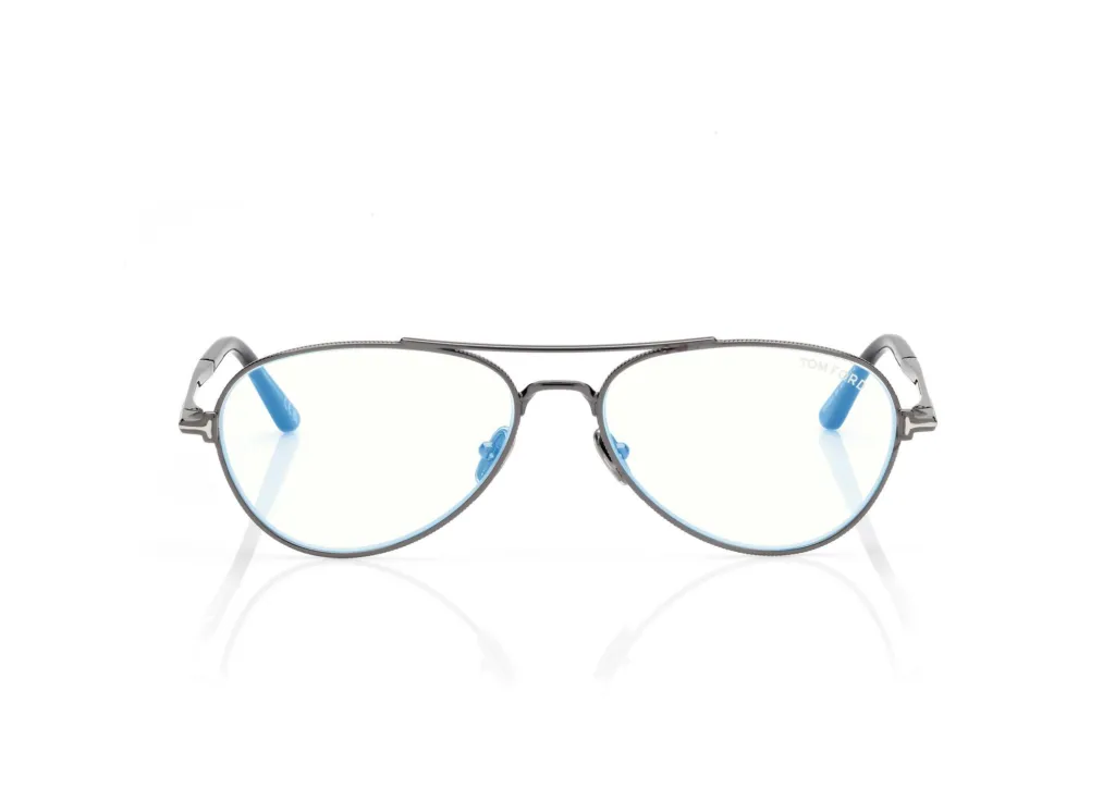 Metalowe oprawki korekcyjne Tom Ford FT6128-B typu aviator na białym tle